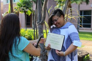 Student receiving certificate of completion